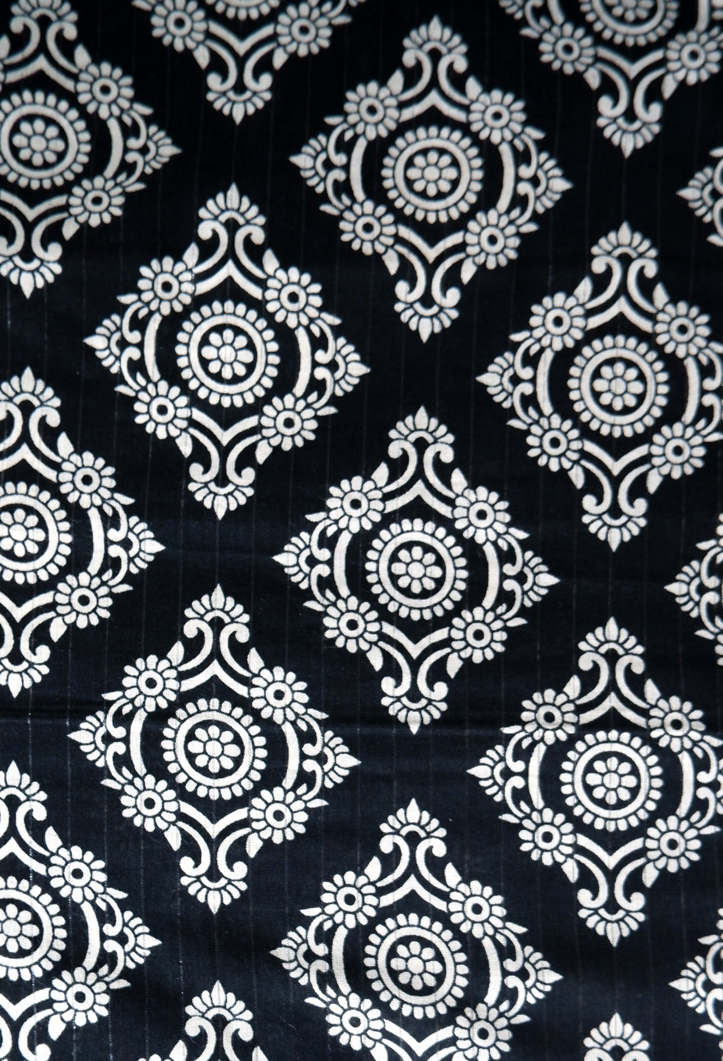 White Floral Pattern Black Fabric with Silver Interwoven Thread